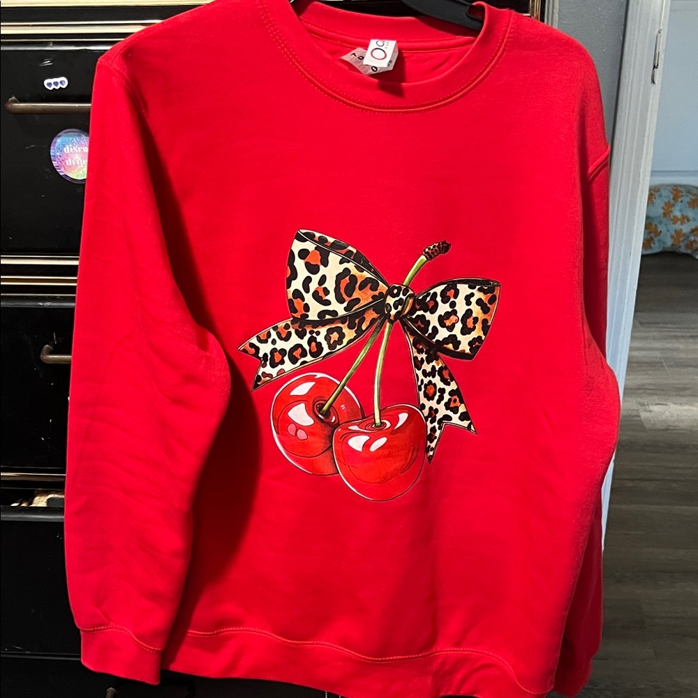 Red Sweatshirt with Cherry and Leopard Bow Design